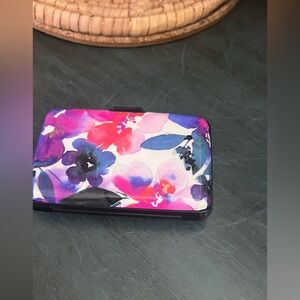 Credit Card Pink holder/wallet plastic but hardshell 
Fits lots of cards.